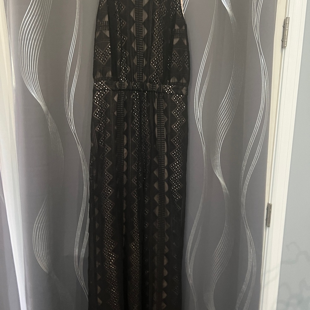 Jumpsuit Size 6(M) Black, lace detail. Like new